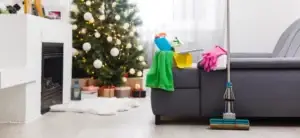 Freshly cleaned living room with Calgary Cleaning Pros' supplies and Swiffer mop, following garbage removal services in Calgary